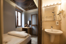 Entire view of double room with private bathroom.